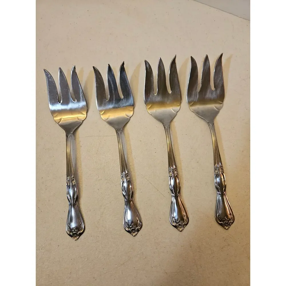 Lot of 4 stainless serving forks by International Silver Co floral flower design